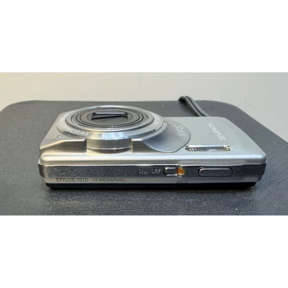 Olympus Stylus 7010 12.0MP Digital Camera Silver Point Shoot w/Batt & charger